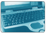 Image: closeup of laptop including a corner of the screen and keyboard.